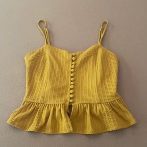 Yellow peplum style tank top